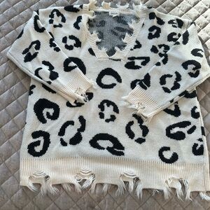 Stylish Black and Cream Leopard Print Sweater